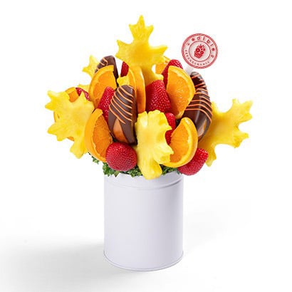 Edible Arrangements – Fresh fruit bouquet with chocolate-dipped strawberries.