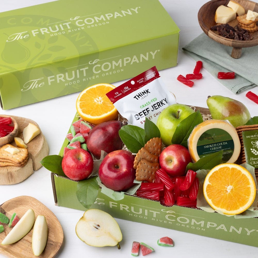 The Fruit Company – Classic gourmet fruit gift box with apples, pears, and citrus.
