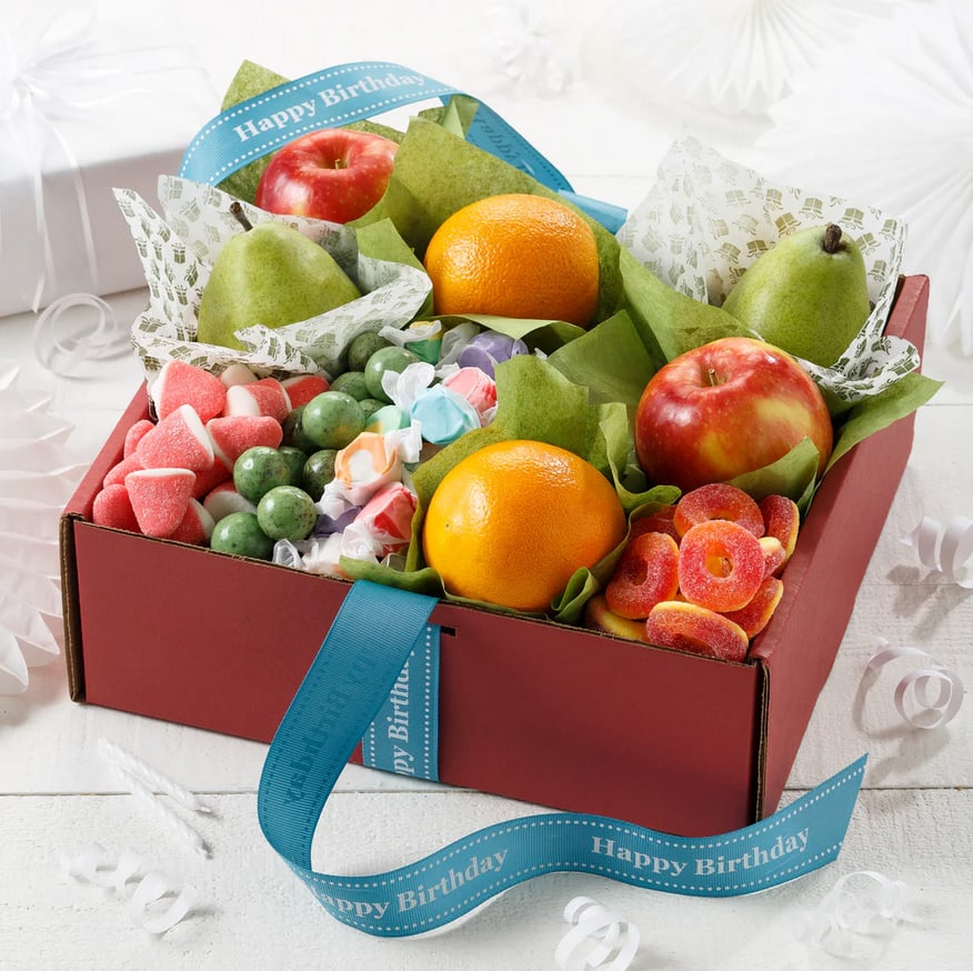 Mrs. Fields – Happy Birthday fruit and sweets gift box with cookies and apples.